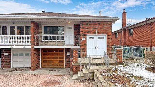 106 Picaro Dr, House semidetached with 3 bedrooms, 2 bathrooms and 2 parking in Toronto ON | Image 1