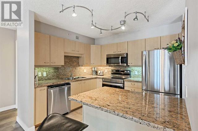 Kitchen with granite counters | Image 10