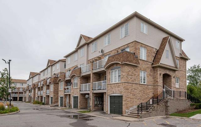 82 - 200 Mclevin Ave, Townhouse with 2 bedrooms, 1 bathrooms and 1 parking in Toronto ON | Image 1
