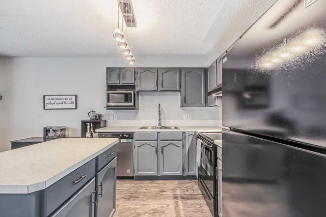 214 Mt Douglas Manor Se, Home with 3 bedrooms, 1 bathrooms and 2 parking in Calgary AB | Image 7