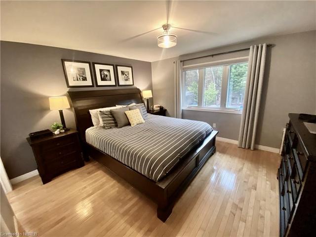 The master bedroom has a walk-in closet as well as a large ensuite bath | Image 43