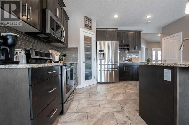 7466 91 Street, House detached with 4 bedrooms, 3 bathrooms and 4 parking in Grande Prairie AB | Image 11