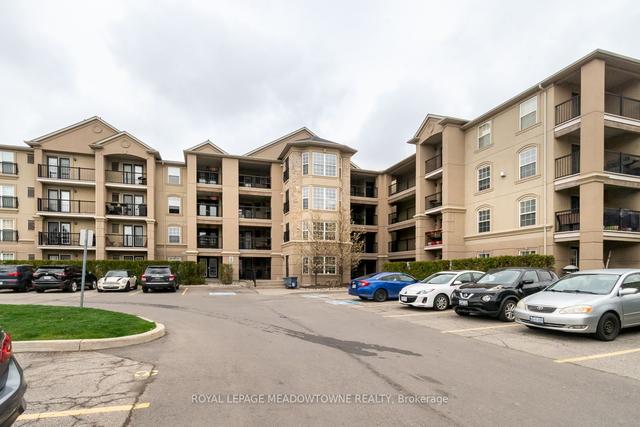 406 - 1483 Maple Ave, Condo with 1 bedrooms, 1 bathrooms and 1 parking in Milton ON | Image 11
