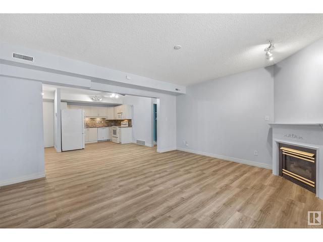 100 - 8811 106a Av Nw, Condo with 2 bedrooms, 2 bathrooms and null parking in Edmonton AB | Card Image