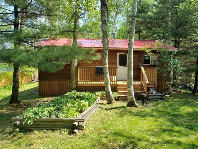 165 Kawigamog Lake Road, House detached with 2 bedrooms, 1 bathrooms and 5 parking in Parry Sound, Unorganized, Centre Part ON | Image 1