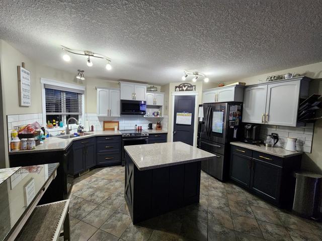 8917 131 Avenue, House detached with 4 bedrooms, 3 bathrooms and 6 parking in Grande Prairie AB | Image 5