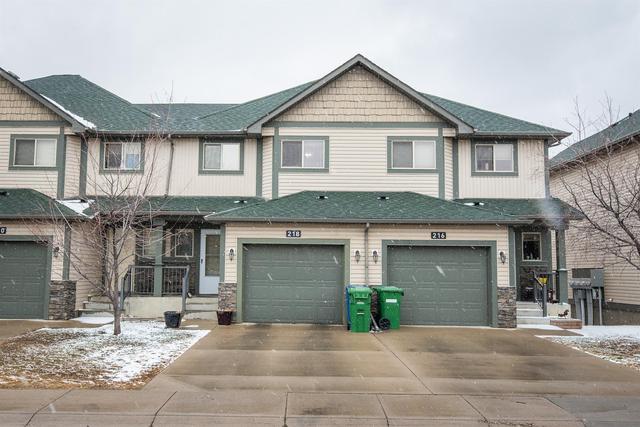 218 Bayside Point Sw, Home with 3 bedrooms, 2 bathrooms and 2 parking in Airdrie AB | Image 1