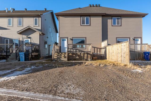 385 Collicott Drive, Home with 4 bedrooms, 3 bathrooms and 3 parking in Wood Buffalo AB | Image 32