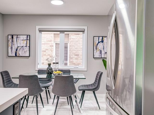 9 John Brabson Cres, House semidetached with 4 bedrooms, 3 bathrooms and 3 parking in Guelph ON | Image 7