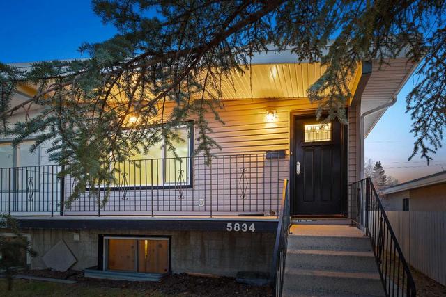 5834 Dalgleish Road Nw, Home with 5 bedrooms, 2 bathrooms and 2 parking in Calgary AB | Image 2