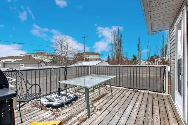 323 Maple Tree Way, House detached with 4 bedrooms, 2 bathrooms and 4 parking in Strathmore AB | Image 33