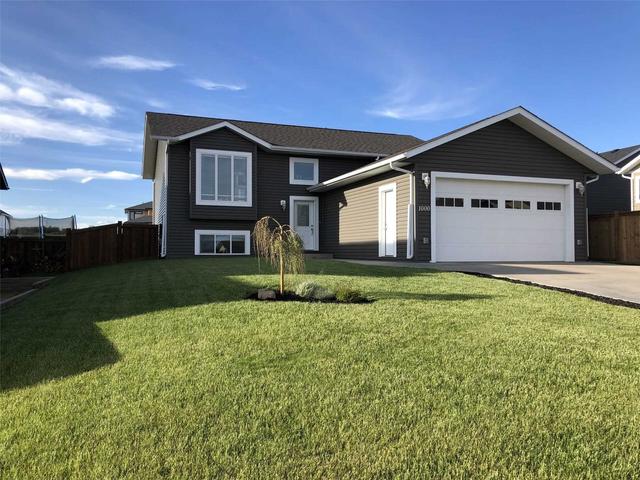 1000 88 Ave, House detached with 3 bedrooms, 3 bathrooms and 4 parking in Dawson Creek BC | Image 1