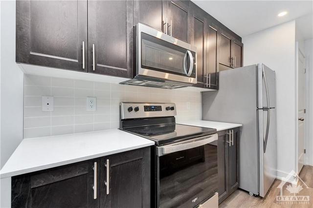b - 310 Tulum Crescent, House attached with 2 bedrooms, 2 bathrooms and 1 parking in Ottawa ON | Image 12
