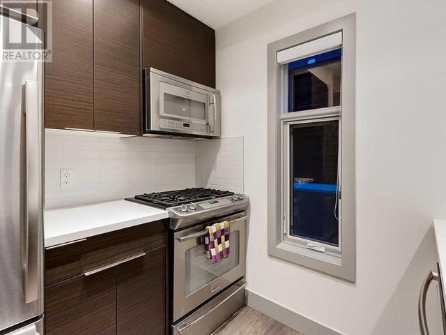 101, - 1707 27 Avenue Sw, Condo with 1 bedrooms, 1 bathrooms and 1 parking in Calgary AB | Image 16