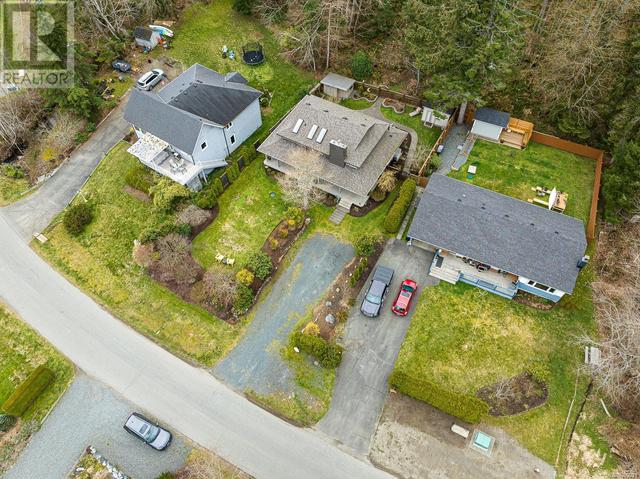 224 Spindrift Rd, House detached with 2 bedrooms, 3 bathrooms and 6 parking in Comox Valley A BC | Image 57