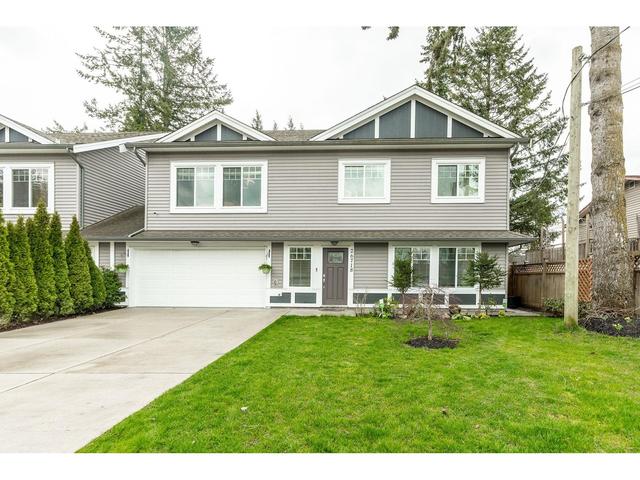 26718 32 Avenue, House attached with 5 bedrooms, 4 bathrooms and 4 parking in Langley BC | Card Image