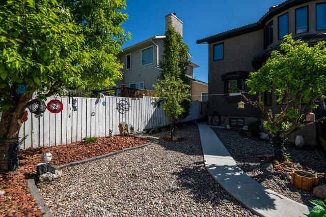 916 Woodbine Boulevard Sw, House detached with 3 bedrooms, 3 bathrooms and 5 parking in Calgary AB | Image 43
