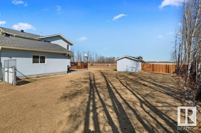 6599 53a Av, House detached with 3 bedrooms, 3 bathrooms and null parking in Redwater AB | Image 61