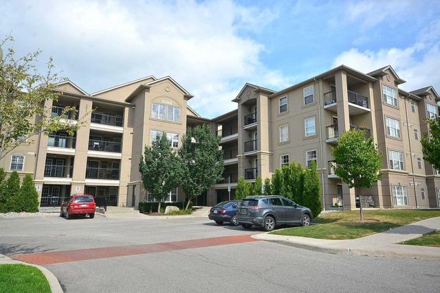 211 - 1380 Main St E, Condo with 3 bedrooms, 2 bathrooms and 2 parking in Milton ON | Image 1