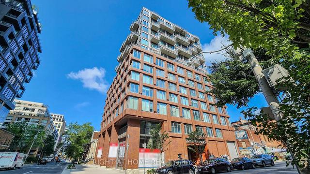410 - 2 Augusta Ave, Condo with 1 bedrooms, 2 bathrooms and 0 parking in Toronto ON | Image 1