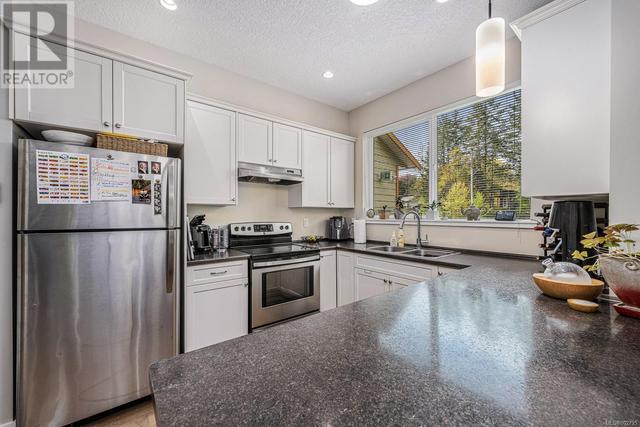 525 - 1577 Dingwall Rd, Condo with 2 bedrooms, 2 bathrooms and 39 parking in Courtenay BC | Image 4