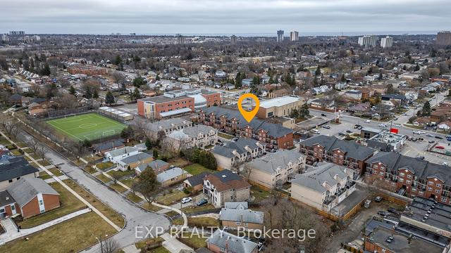 105 - 35 Strangford Lane, Townhouse with 2 bedrooms, 2 bathrooms and 1 parking in Toronto ON | Image 9
