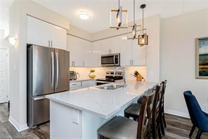423 - 610 Farmstead Dr, Condo with 2 bedrooms, 2 bathrooms and 1 parking in Milton ON | Image 3