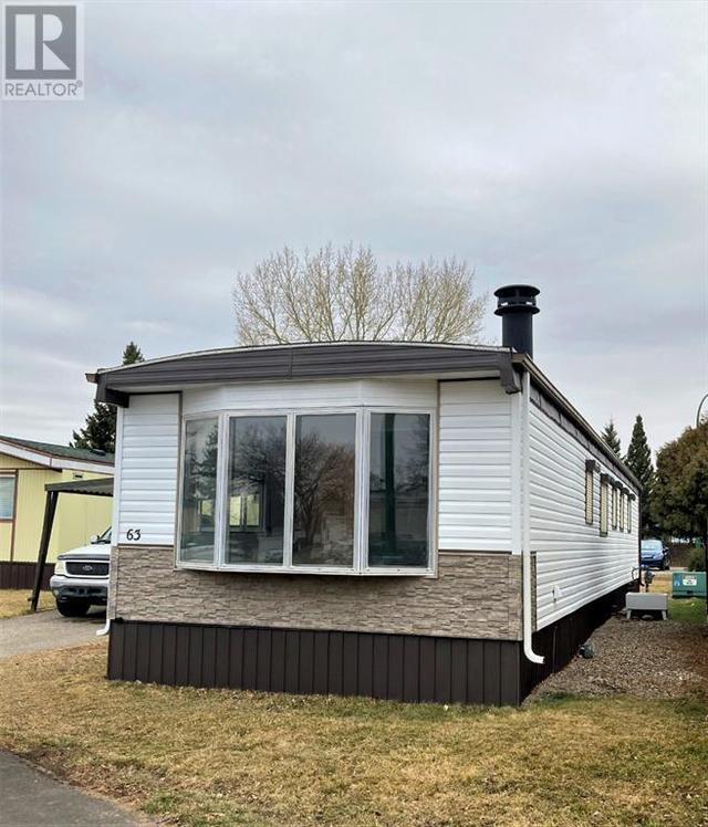 63, - 2300 13 Street N, Home with 2 bedrooms, 1 bathrooms and 2 parking in Lethbridge AB | Card Image