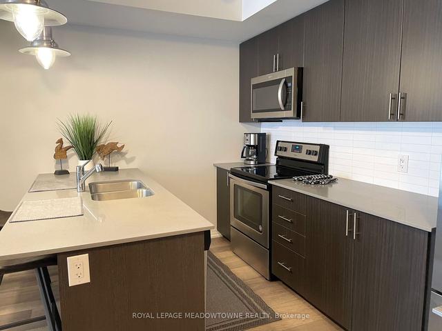 102 - 1208 Main St E, Townhouse with 2 bedrooms, 3 bathrooms and 1 parking in Milton ON | Image 9