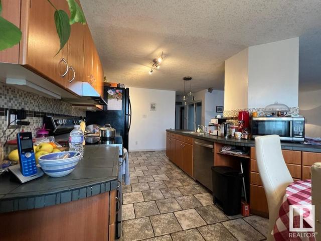 15722 107a Av Nw, House detached with 4 bedrooms, 2 bathrooms and null parking in Edmonton AB | Image 5