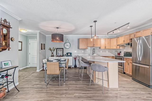 2115 - 303 Arbour Crest Drive Nw, Condo with 2 bedrooms, 2 bathrooms and 1 parking in Calgary AB | Image 7