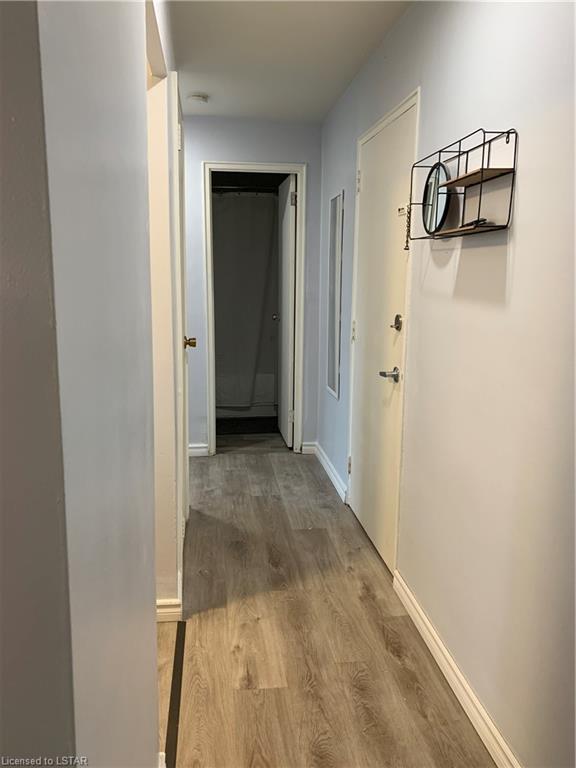 Hallway leading to bathroom | Image 10