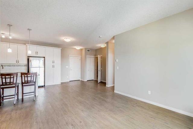 1407 - 522 Cranford Drive Se, Condo with 2 bedrooms, 2 bathrooms and 1 parking in Calgary AB | Image 10