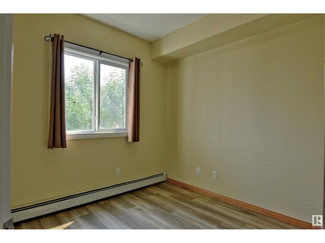 207 - 10118 95 St Nw, Condo with 2 bedrooms, 2 bathrooms and 1 parking in Edmonton AB | Image 12