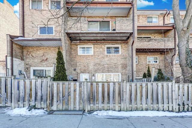 61 - 91 Muir Dr, Townhouse with 3 bedrooms, 2 bathrooms and 1 parking in Toronto ON | Image 1