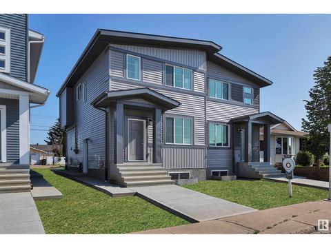6910 132 Av Nw, House semidetached with 3 bedrooms, 2 bathrooms and null parking in Edmonton AB | Card Image