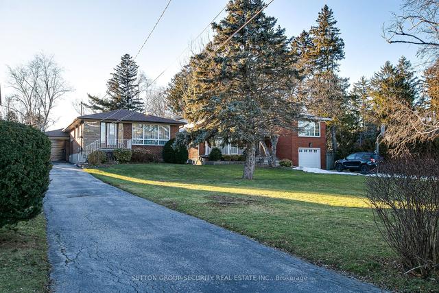36 Mcdairmid Rd, House detached with 3 bedrooms, 1 bathrooms and 7 parking in Toronto ON | Image 1