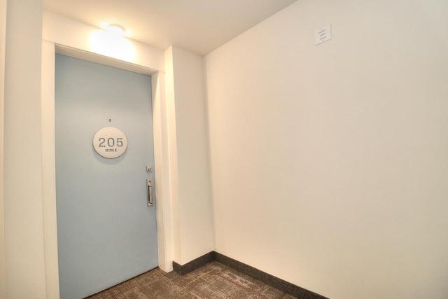 205 - 120 18 Avenue Sw, Condo with 2 bedrooms, 2 bathrooms and 1 parking in Calgary AB | Image 1
