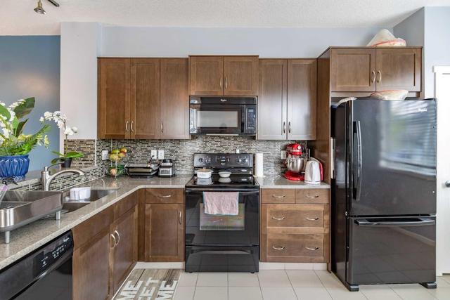 25 Kinlea Way Nw, Home with 3 bedrooms, 2 bathrooms and 3 parking in Calgary AB | Image 12