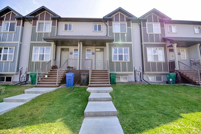 871 Greywolf Run N, Home with 2 bedrooms, 2 bathrooms and 2 parking in Lethbridge AB | Image 1