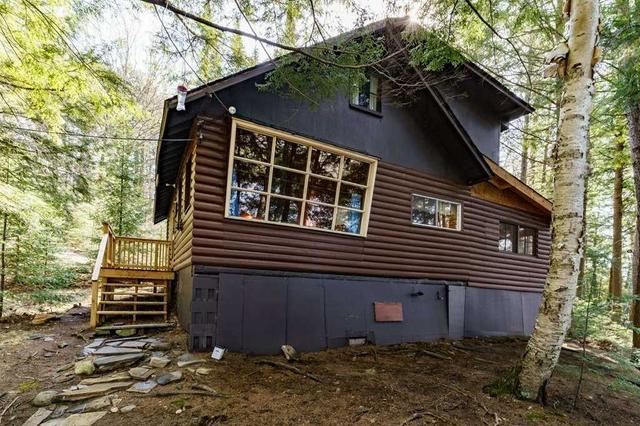 1409 West Oxbow Lake Rd, House detached with 3 bedrooms, 1 bathrooms and 4 parking in Lake of Bays ON | Image 16