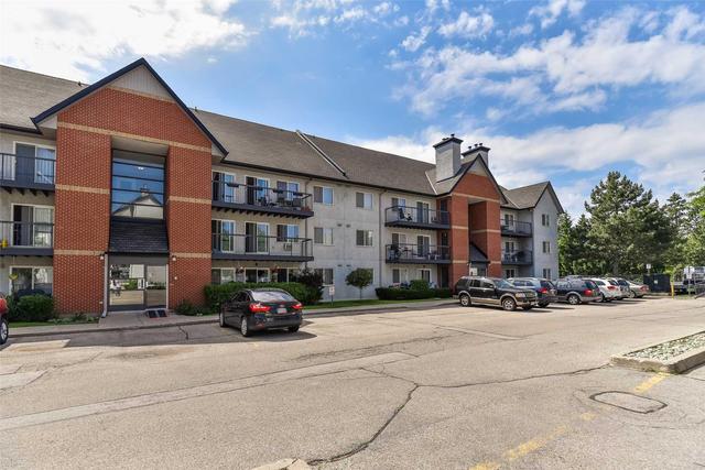 724 - 1450 Glen Abbey Gate, Condo with 3 bedrooms, 2 bathrooms and 1 parking in Oakville ON | Image 1