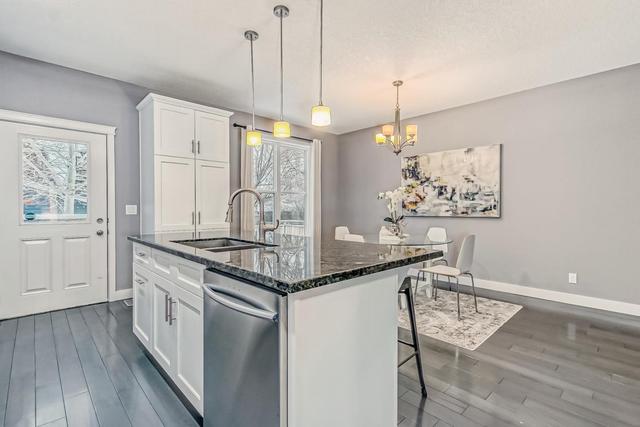 604 38 Street Sw, Home with 3 bedrooms, 2 bathrooms and 4 parking in Calgary AB | Card Image