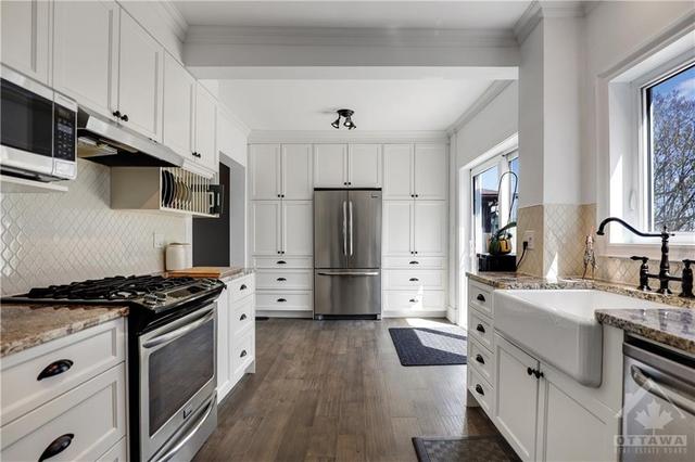 Kitchen - marble counters with fantastic gas stove! | Image 10