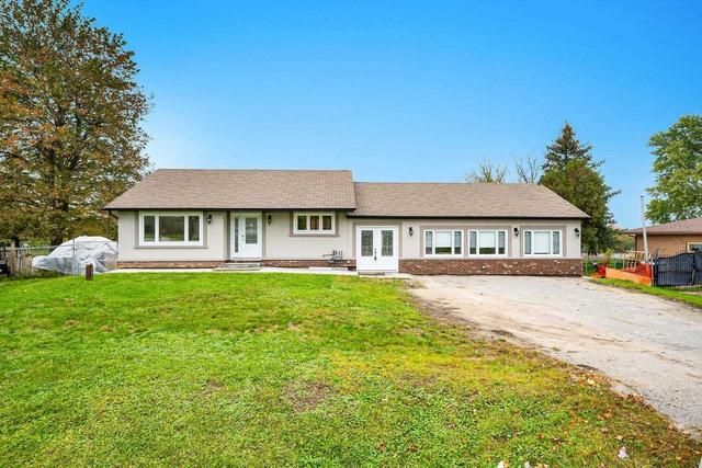 7152 Highway 9 Rd, House detached with 3 bedrooms, 3 bathrooms and 6 parking in New Tecumseth ON | Image 1