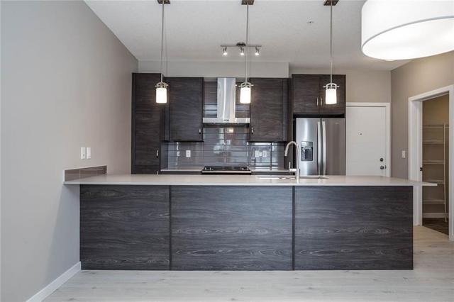208 - 11 Mahogany Circle Se, Condo with 2 bedrooms, 2 bathrooms and 1 parking in Calgary AB | Image 2