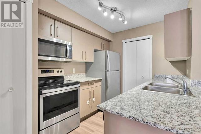 1205, - 4641 128 Avenue Ne, Condo with 2 bedrooms, 2 bathrooms and 1 parking in Calgary AB | Image 1