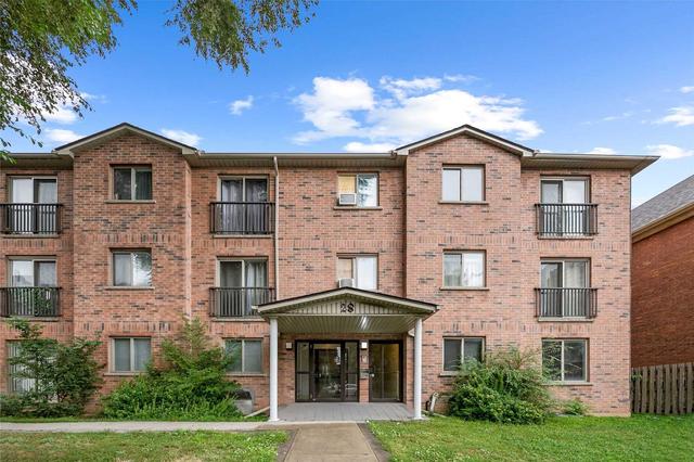 206 - 28 Victoria Ave N, Condo with 2 bedrooms, 1 bathrooms and 1 parking in Hamilton ON | Image 1