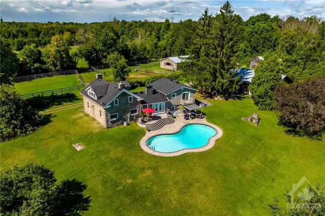 2415 County Rd 20 Road, House detached with 3 bedrooms, 3 bathrooms and 12 parking in North Grenville ON | Image 23