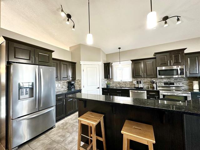 7726 - covington Way, House detached with 5 bedrooms, 3 bathrooms and 8 parking in Grande Prairie County No. 1 AB | Image 12